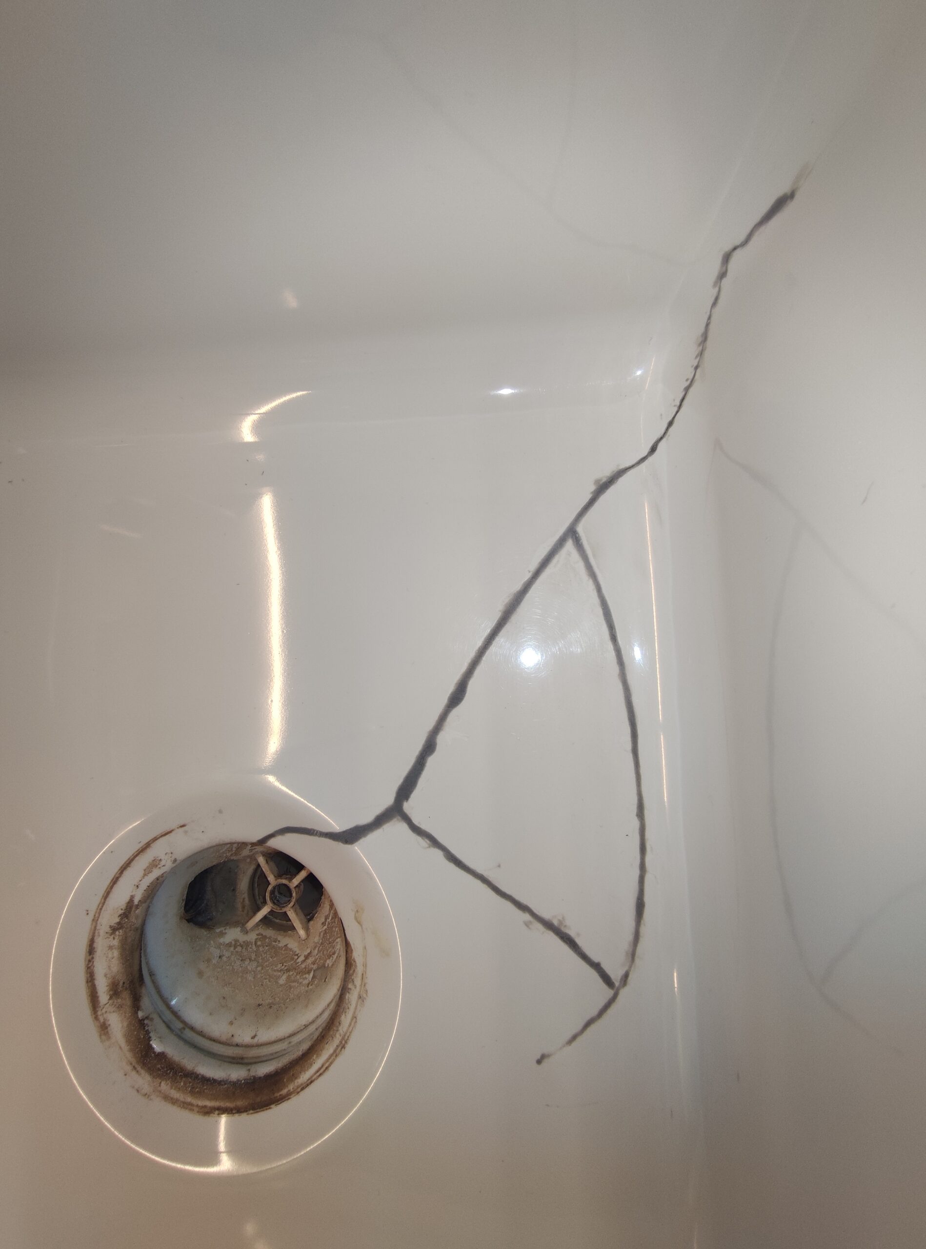 s11 Cracked butler sink from plug hole Repair begins scaled